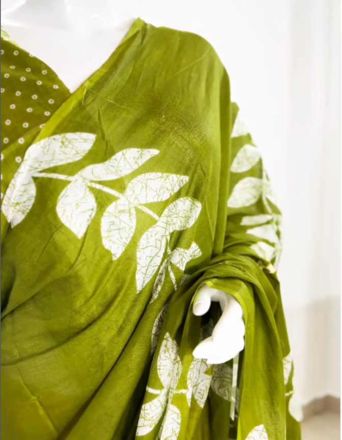 a vibrant Green body with bold white leaf motifs,
